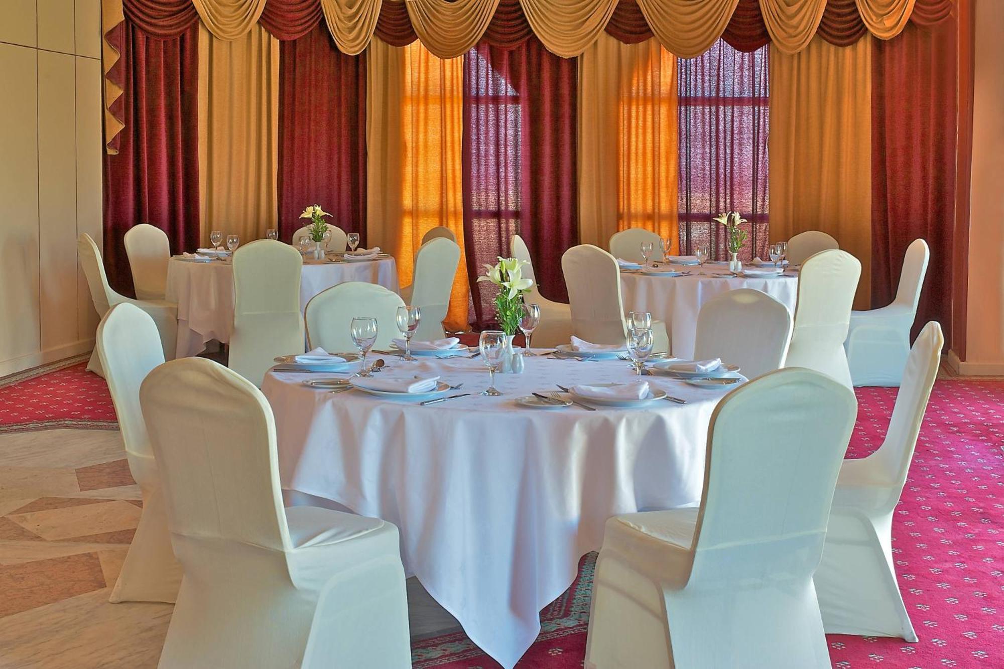 Sheraton Montazah Hotel Alexandria Exterior photo A table set for a formal dinner